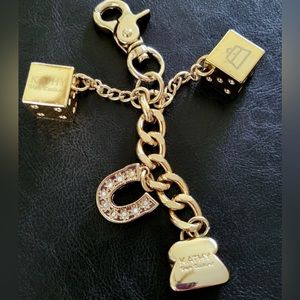 KATHY VAN ZEELAND GOLD LUCKY CHARM BAG FOB/ KEYCHAIN CLIP DICE, HORSESHOE, PURSE